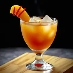 Une image de Le Gingembre Peach Mambo: Un cocktail qui secoue les papilles gustatives