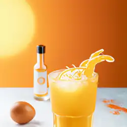 Une image de Cocktail Pêche orange solaire : la boisson qui va illuminer ta journée ☀️🍹 - image générée par IA (DALL-E)